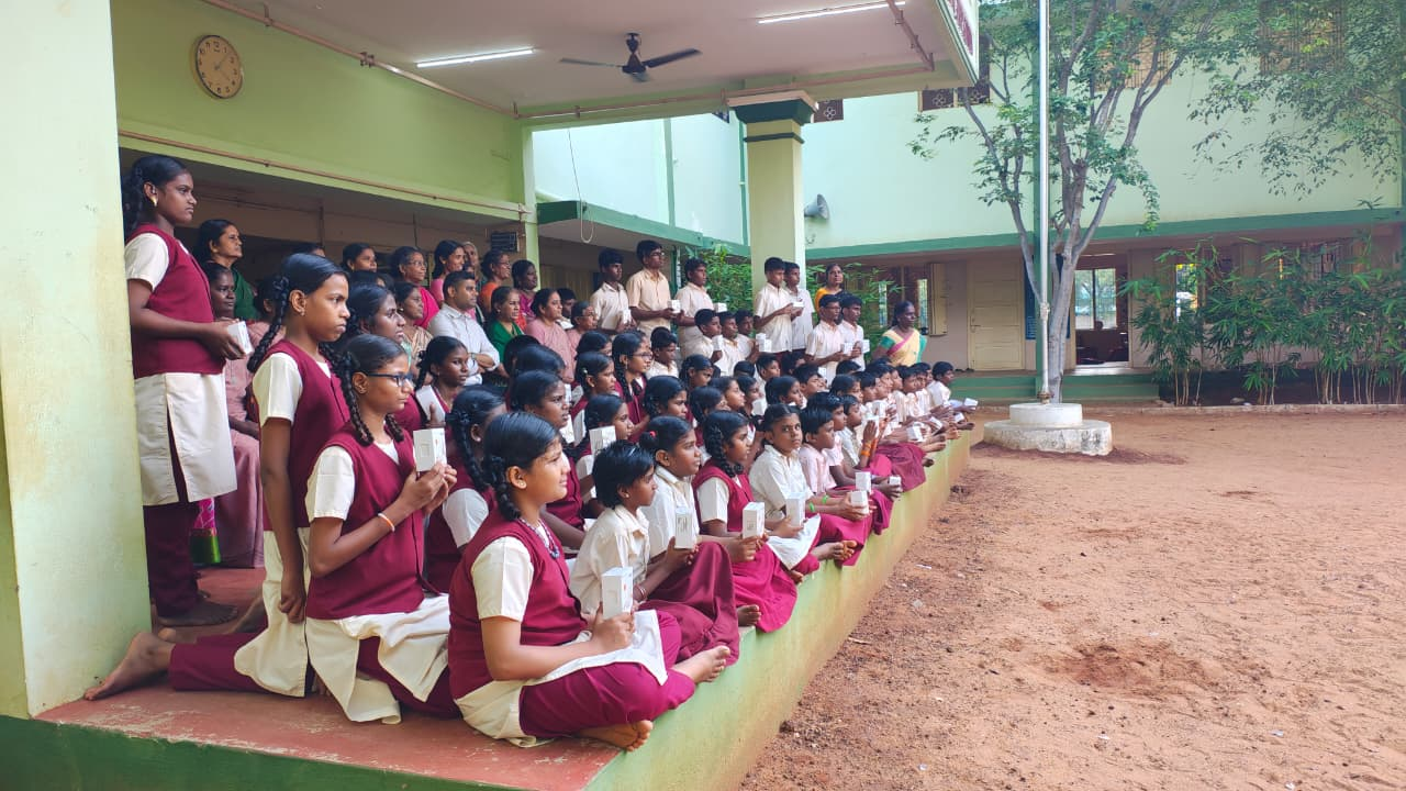 Children holding hearing aids after distribution at Dolours School, Trichy