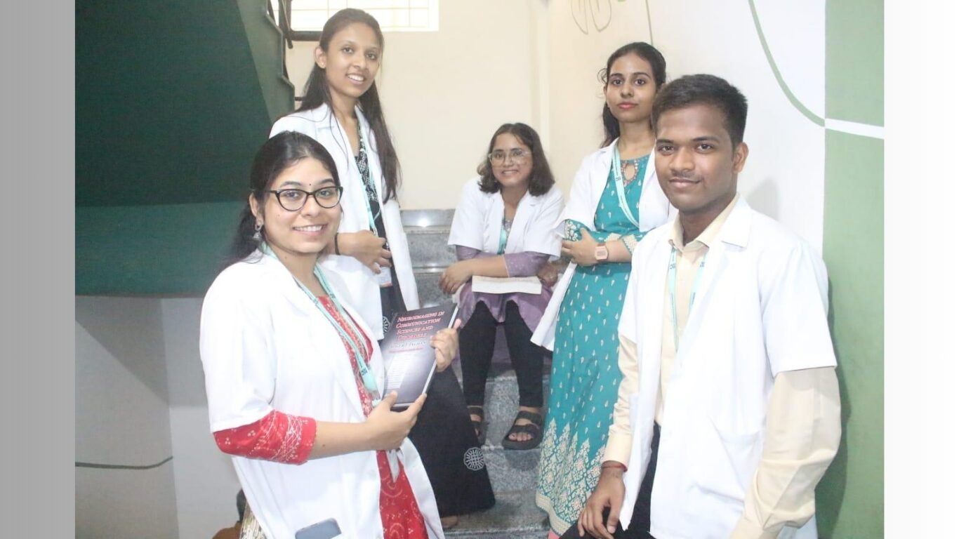 College student reviewing options for speech and hearing programs after 12th, with books, laptop, and audiology symbols in the background.